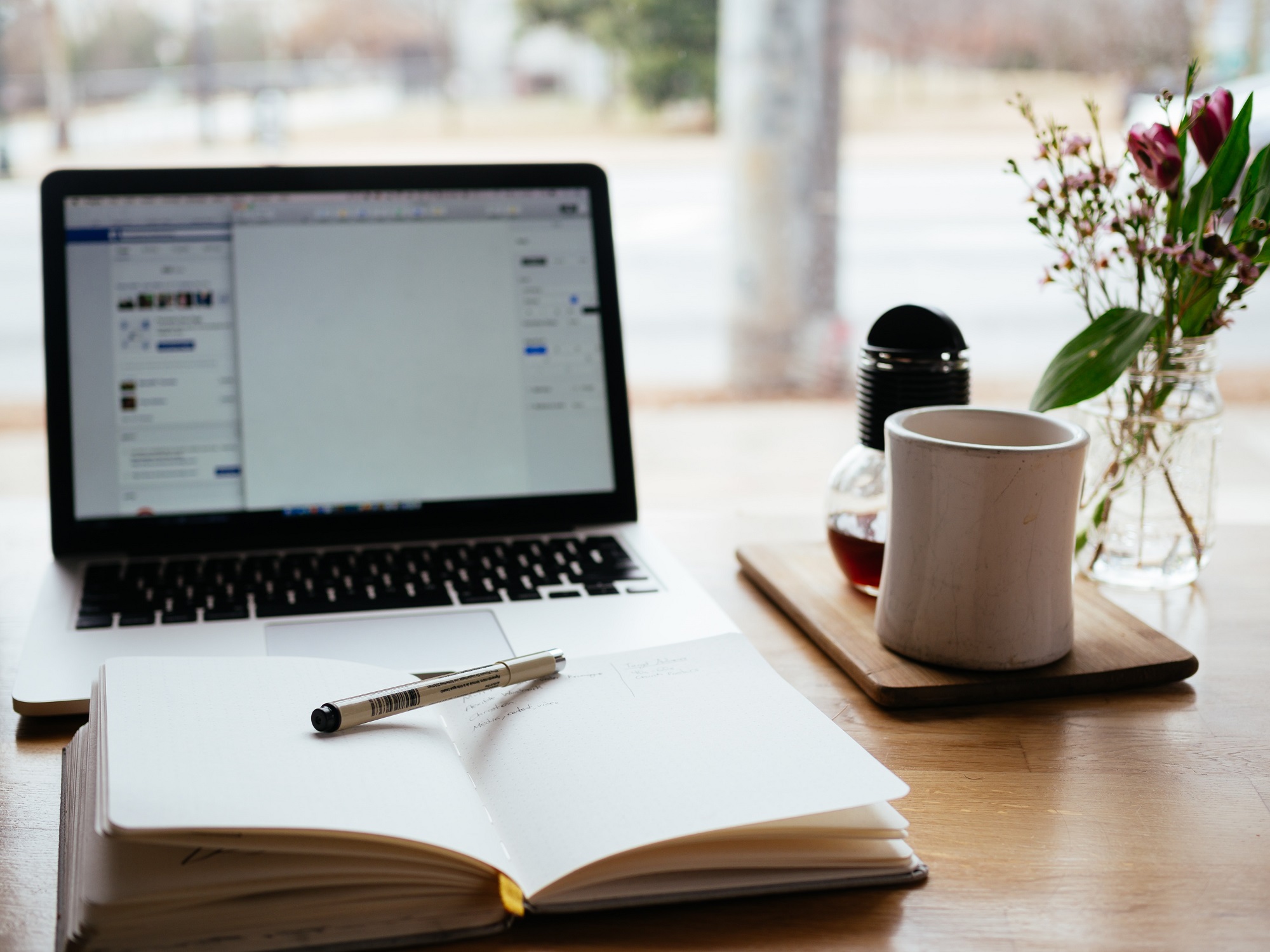 Laptop and Notepad Photo by Nick Morrison on Unsplash