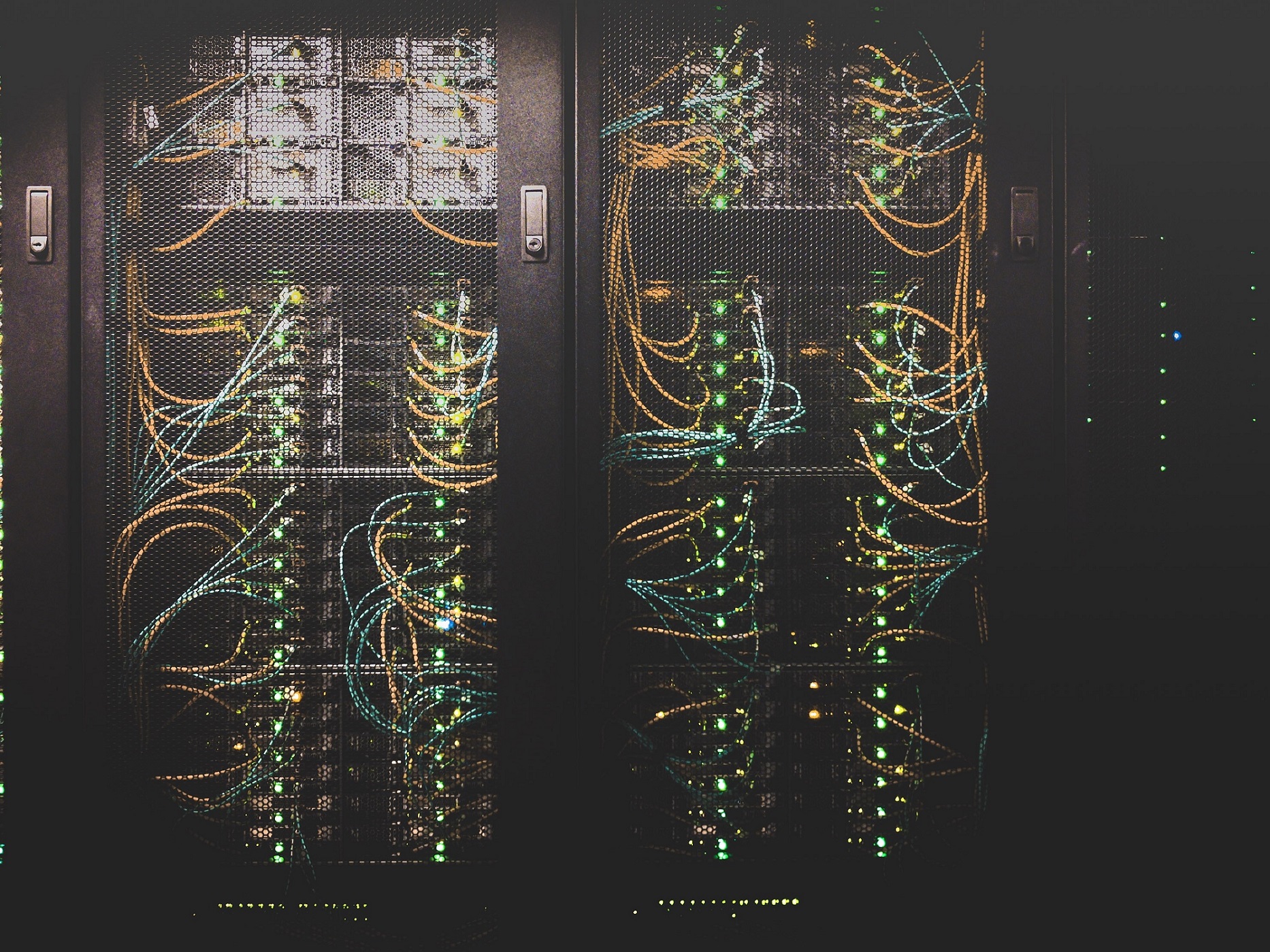 Cables infront of Server Photo by Taylor Vick on Unsplash