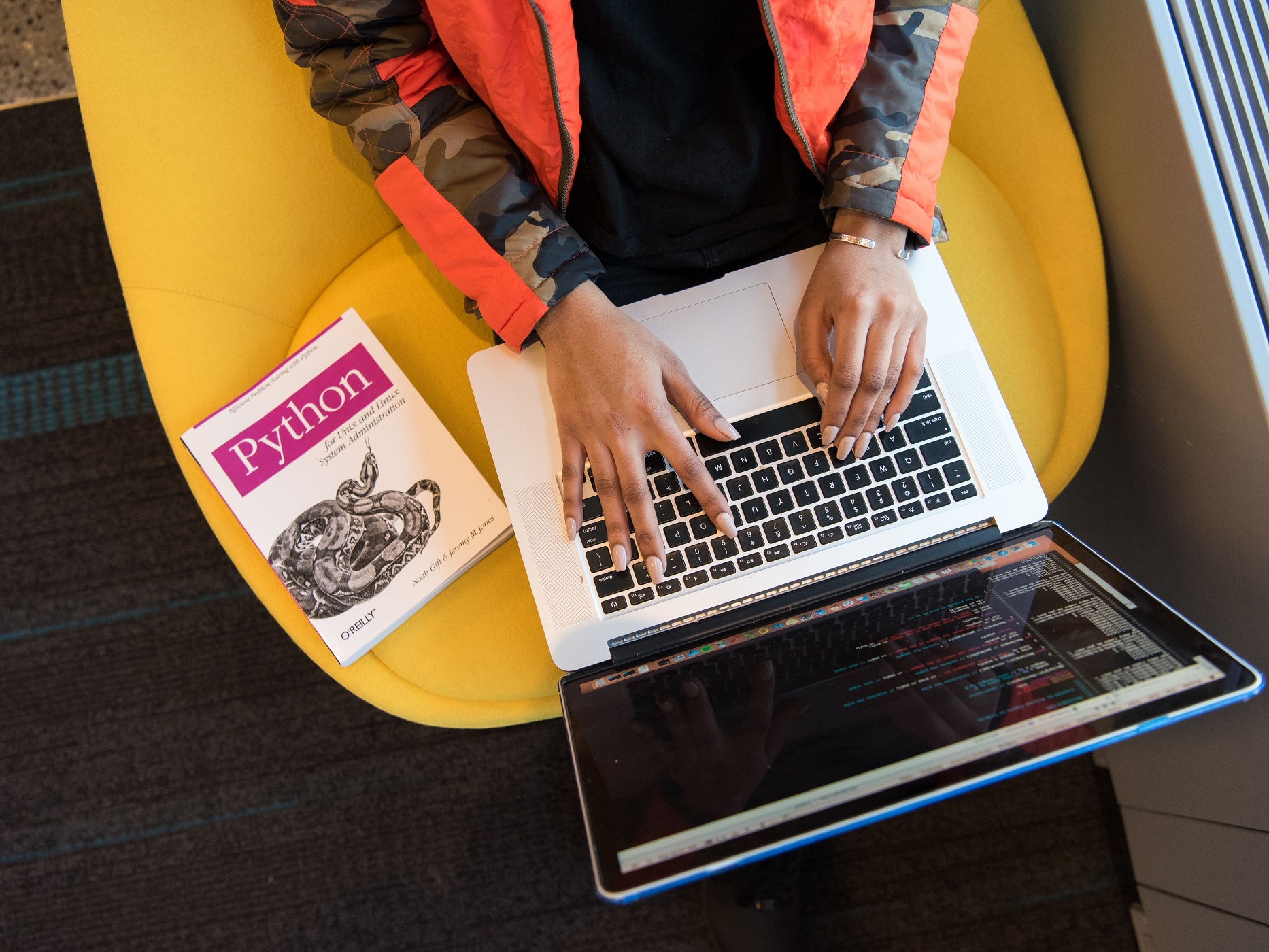 Person sitting with computer by Christina Morillo from Pexels